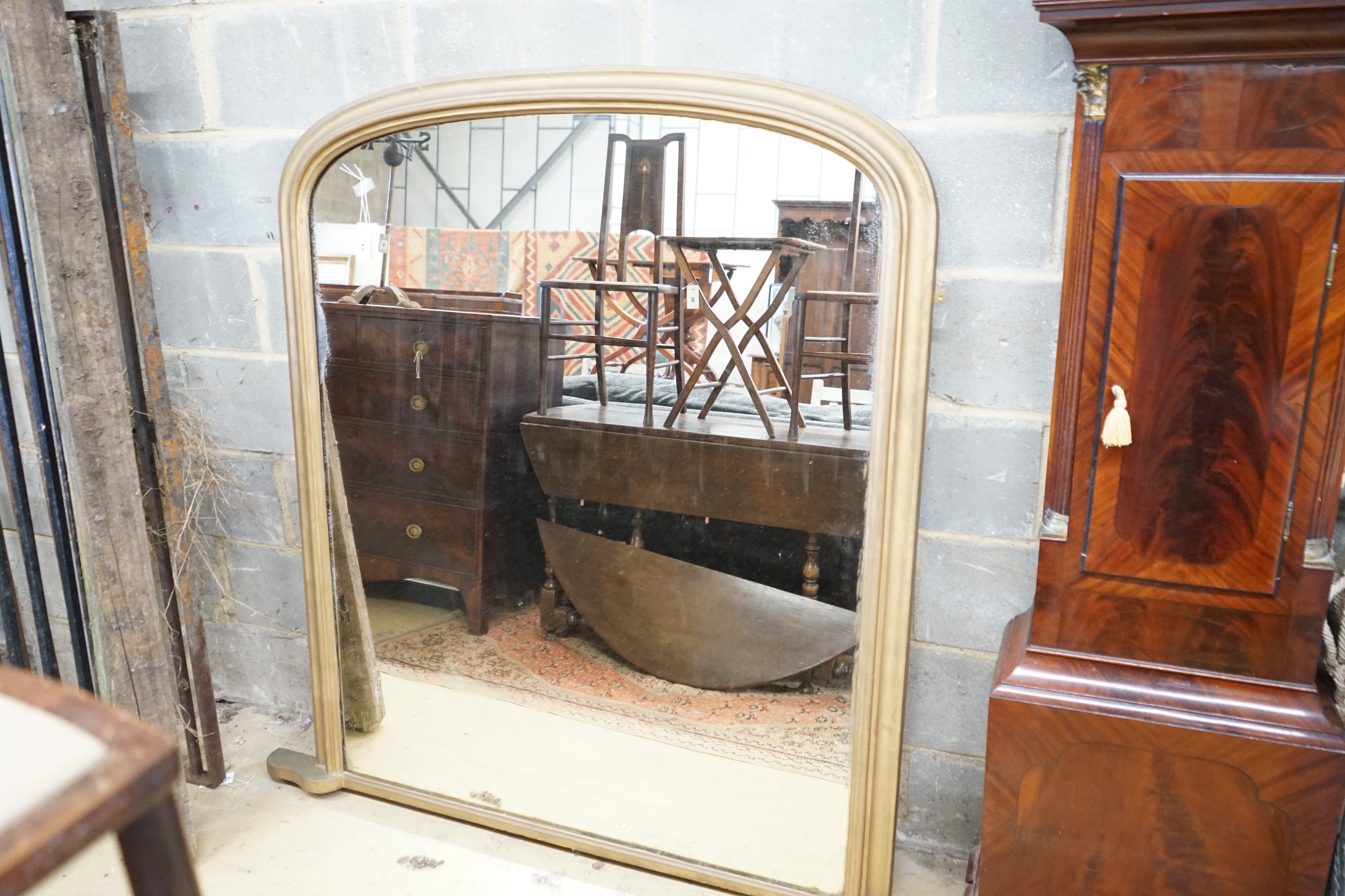 A Victorian gilt framed overmantel mirror, re-painted, width 124cm, height 149cm